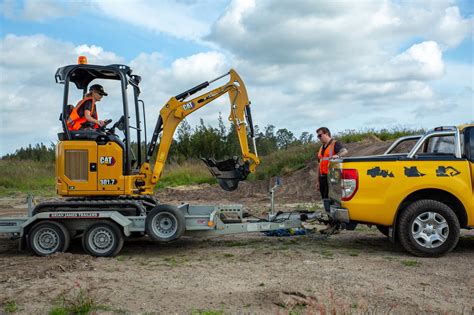 how to secure a mini excavator on a trailer|how to tie an excavator.